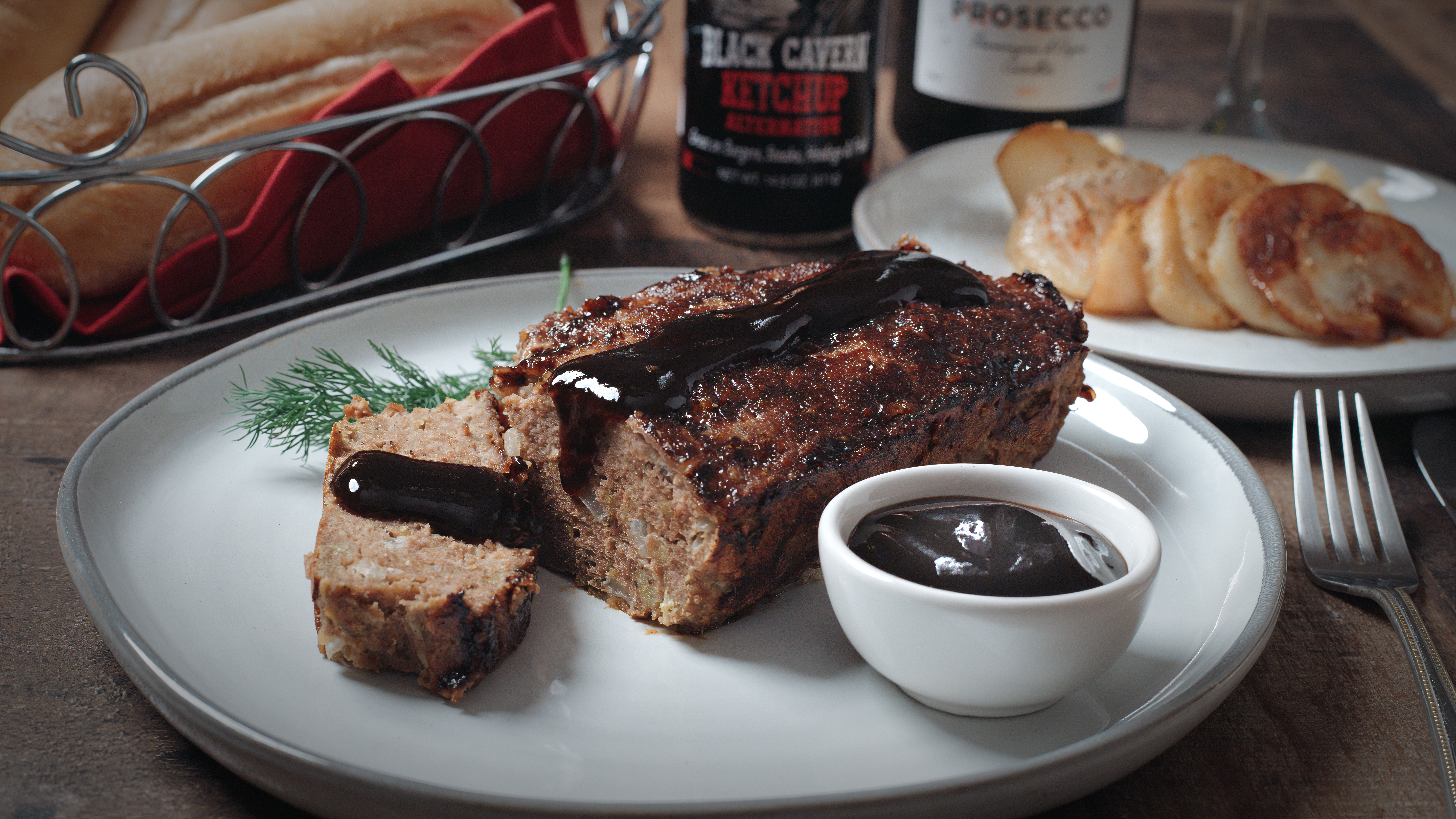 Meatloaf with Black Cavern sauce drizzled over it