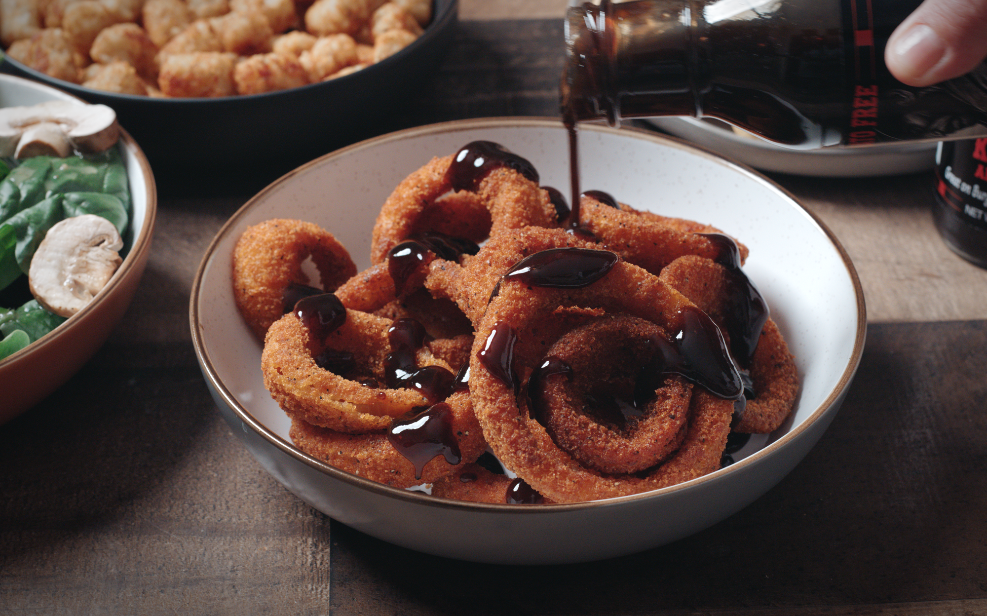 Onion rings with Black Cavern sauce